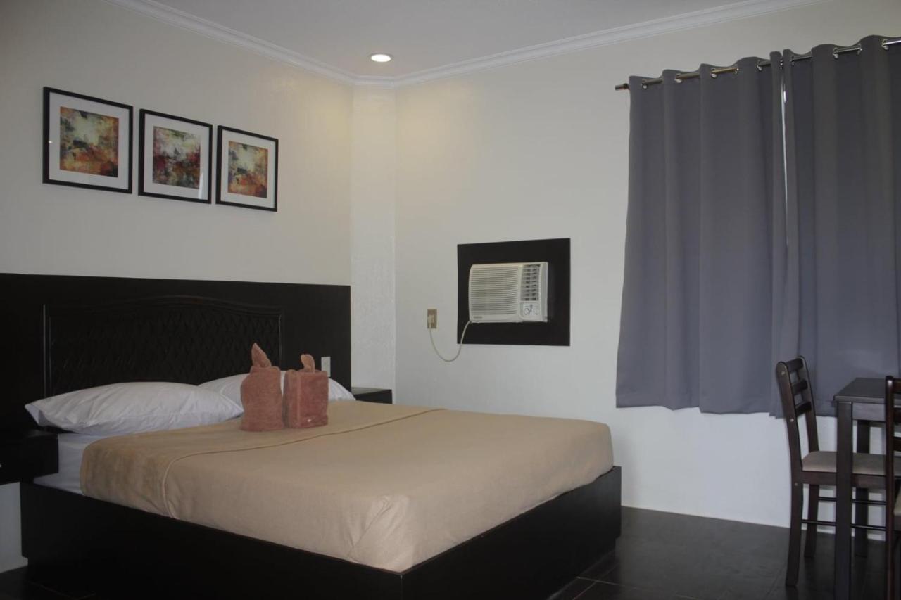 เรด ไนท์ การ์เดน อปาร์เตล Hotel Davao ภายนอก รูปภาพ